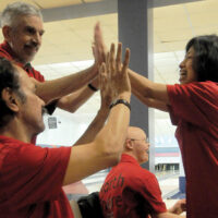 NS Bowl3 Special Olympians 
 Mar 22-18
the Special Olympians team the "Alley Cats" celebrate. photo Mike Wakefield